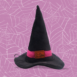 Gorro de bruja con fondo de telaraña.